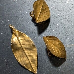 Vintage Trifari Gold Leaf Clip Earrings And Leaf Pendant